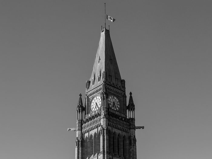 Clock tower at Canada's Parliament Buildings in black and white