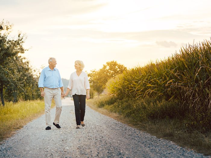Everyday aches and pains - seniors walking outdoors