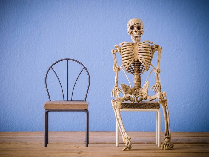 Halloween jokes - lonely skeleton sitting on chair