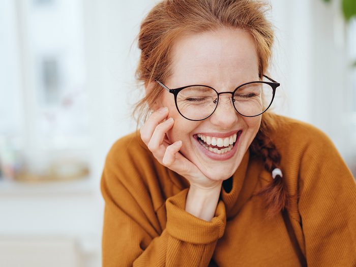 Benefits of laughing - woman laughing