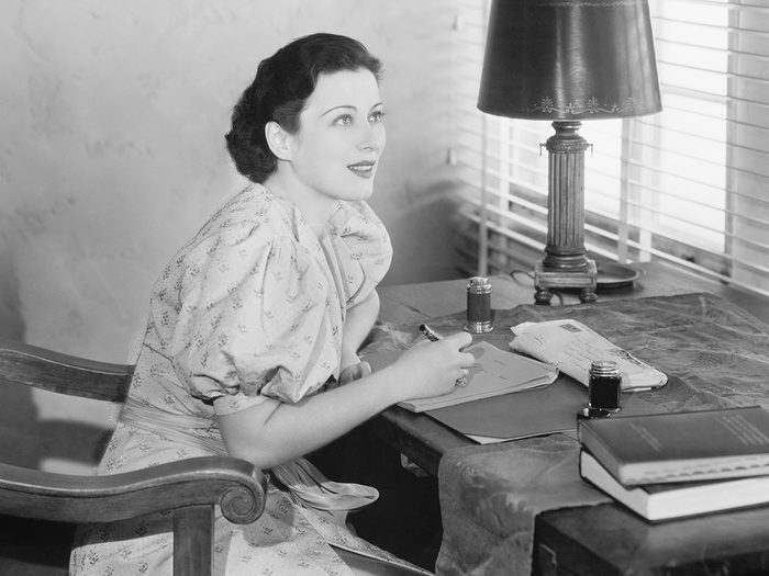 Woman writing letter - vintage photo