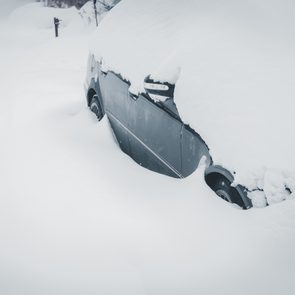 Car break down in winter - car buried in snow
