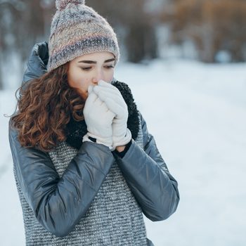 Freezing cold woman in winter