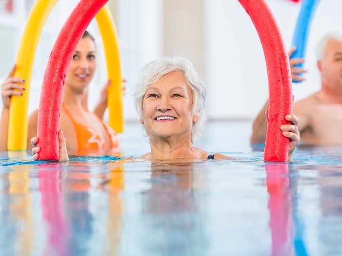 Do group fitness classes work - senior woman in pool