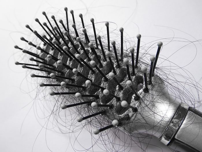 Hair brush filled with hair