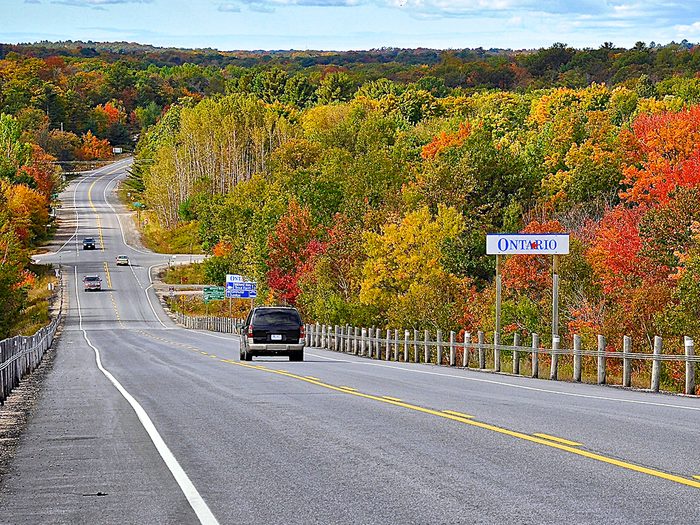Ontario staycation tax credit - car on road trip in fall
