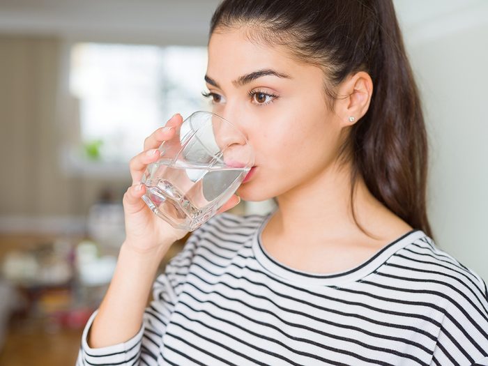 Beauty eating - woman drinking water