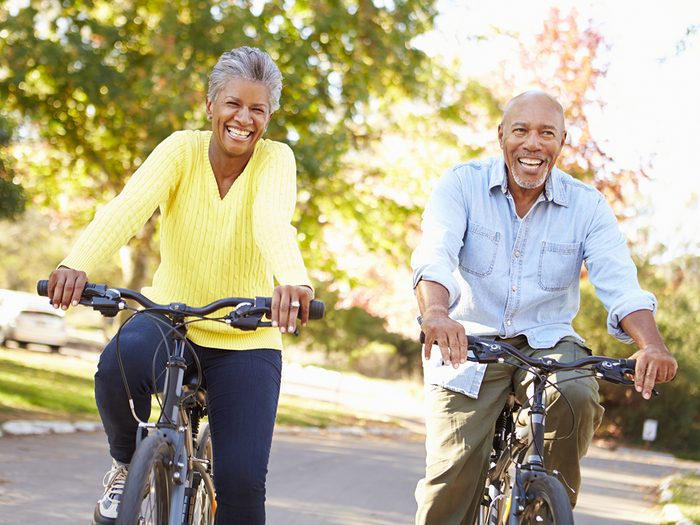 Colorectal cancer Canada - mature couple on bikes