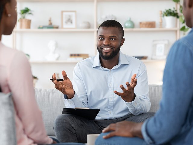 Friendly therapist with couple