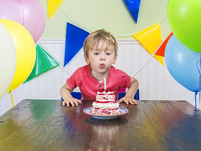 What happens when you eat too much sugar - little boy with birthday cake