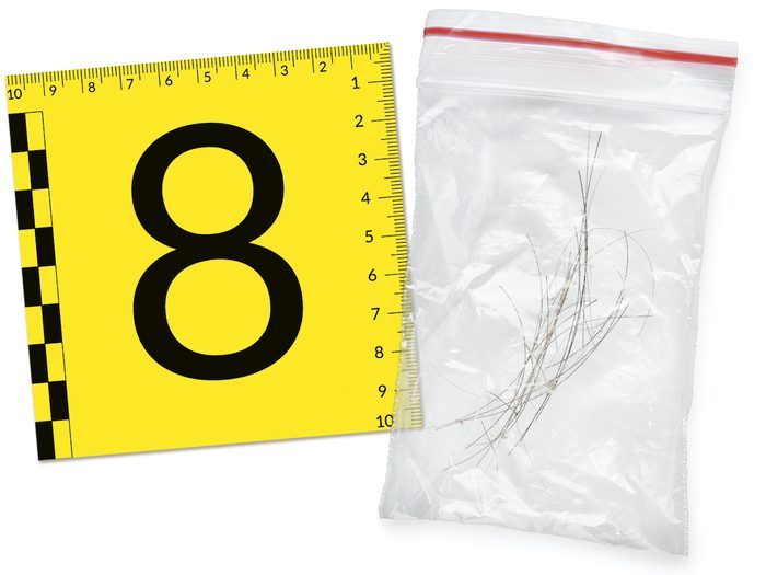 Cold Cases in Canada - Evidence marker and hair in a baggy