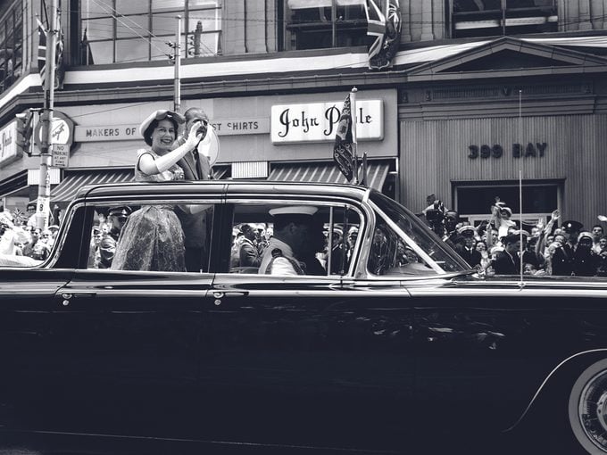 Queen Elizabeth Ii In Automobile, Moving Past Spectators On Bay Street