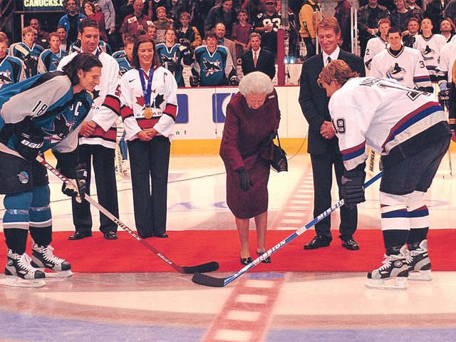 October 2002, dropping the puck for a game between the Vancouver Canucks and San Jose Sharks, while on her Golden Jubilee tour ofCanada.