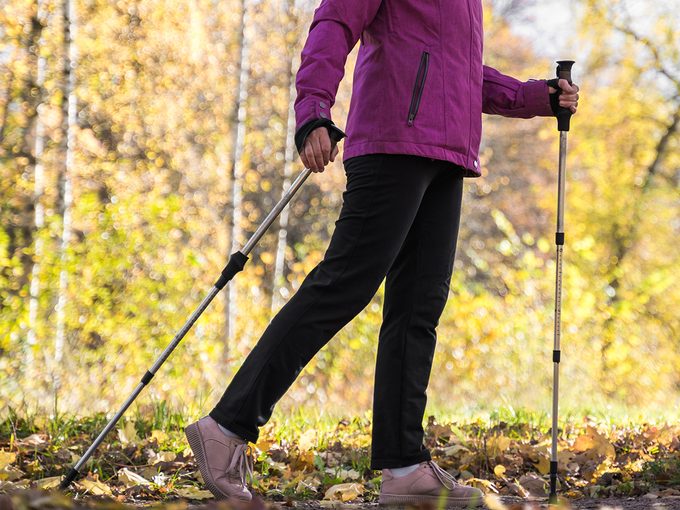Nordic walking - woman with poles