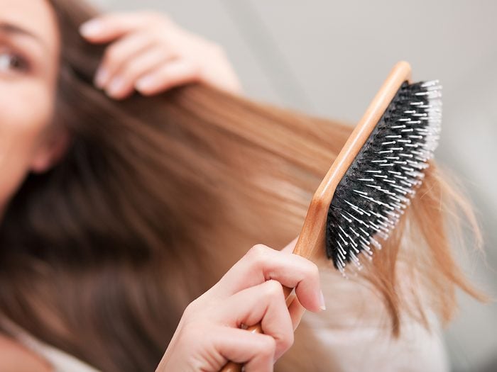 Cantaloupe benefits - woman brushing hair
