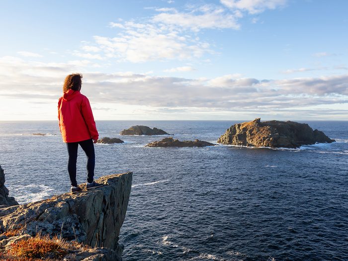 Hiking in Canada - woman on Twillingate cliff