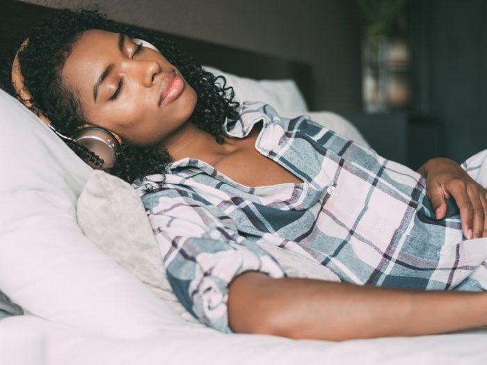 Woman Sleeping With Headphones