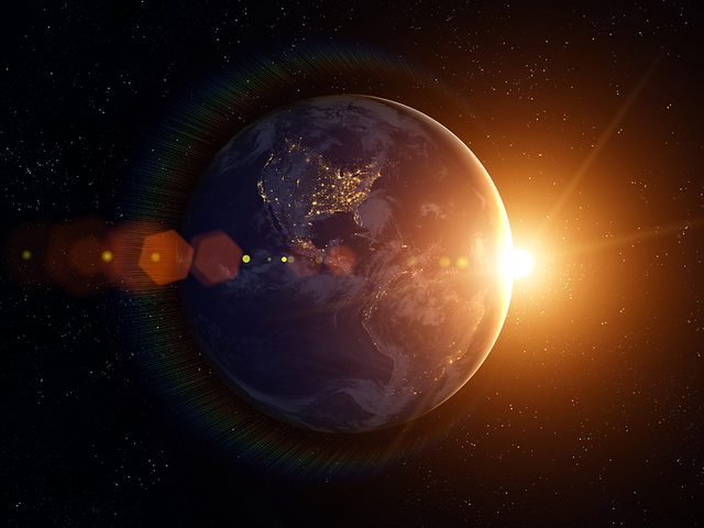 Earth and sun in space