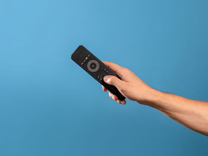 Nail polish hacks - hand holding remote control