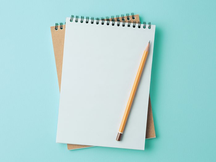 Notepad and pencil isolated