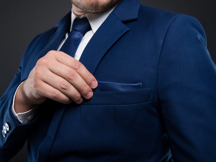 Pockets sewn shut - man in suit