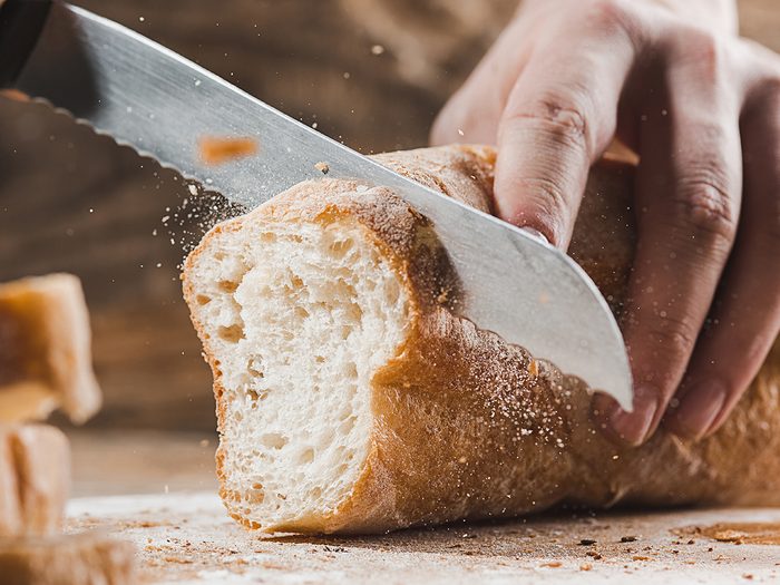Slicing into bread loaf