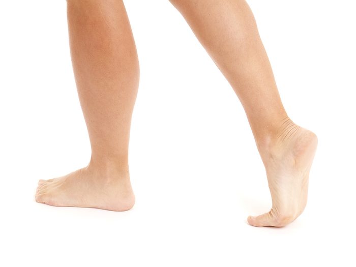 Bare feet walking isolated