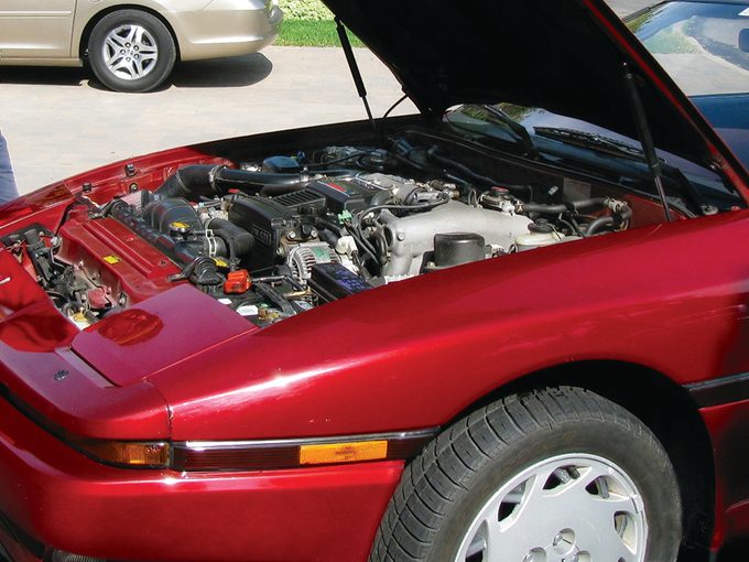 Toyota Supra Mark III - Hood up, showing engine