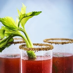 Caesar drink origin - three Caesar cocktails with celery stalk