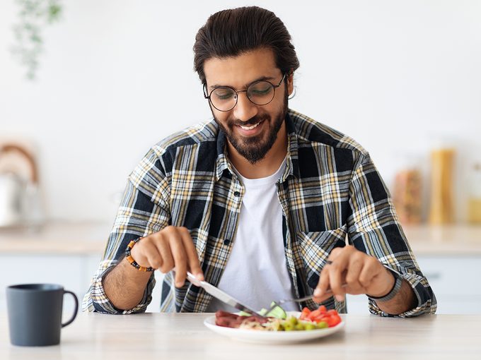 What is intuitive eating - man enjoying meal