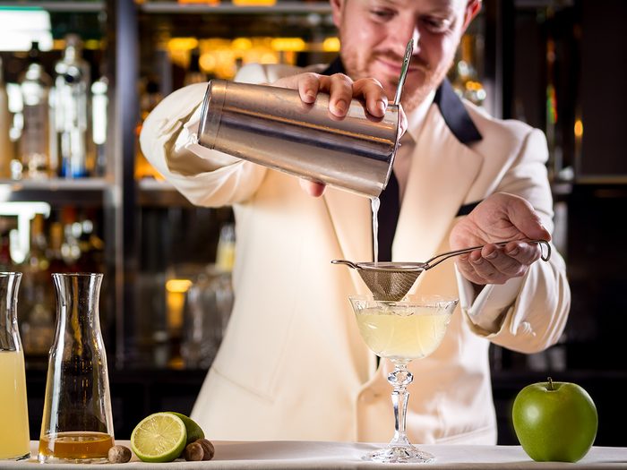 Bartender mixing cocktails