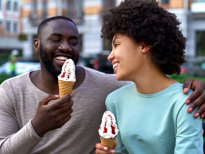 Couple enjoying ice cream cones