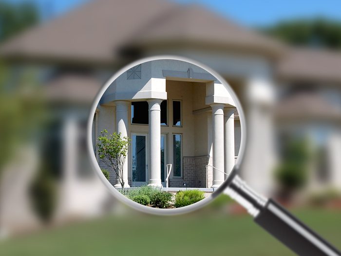 Home under magnifying glass - Google Maps blurred