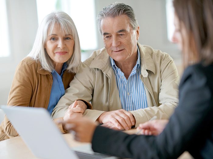 Estate planning - mature couple meeting with adviser