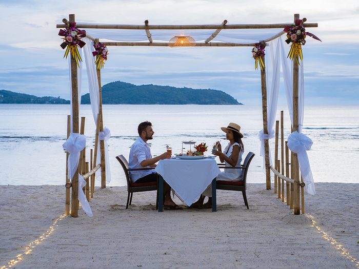 Resort dining - couple on beach