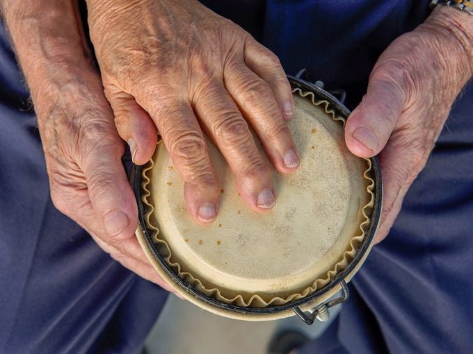 Benefits of music therapy - Elderly couple with drum