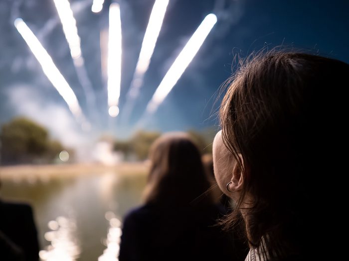 Person watching fireworks 