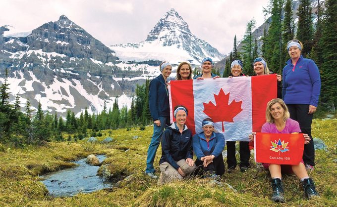 Mount Assiniboine Hike - Hikers Holding Canada Flag
