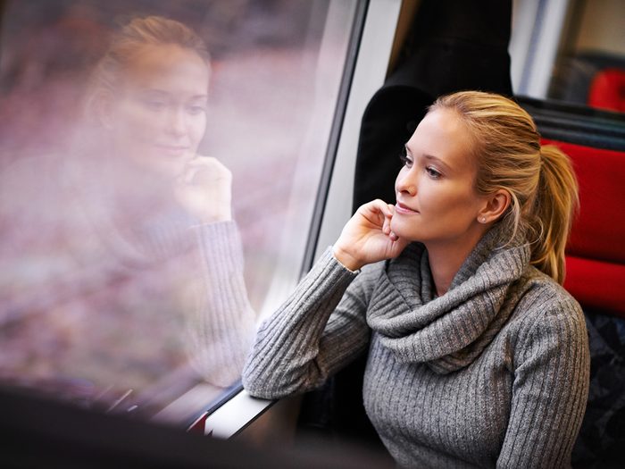 Train Facts - Woman looking out a window