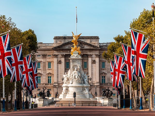 Buckingham Palace with Union Flags down the Mall