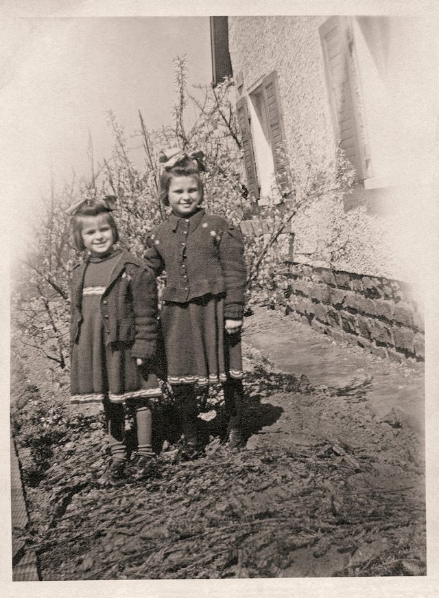 DNA reunion stories - Old photo of two children standing outdoors
