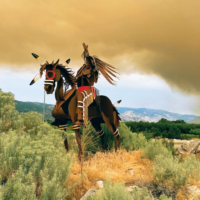 Horse And Rider Sculpture amid Wildfires