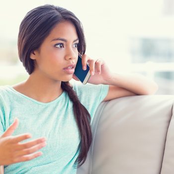 Anxious woman on phone