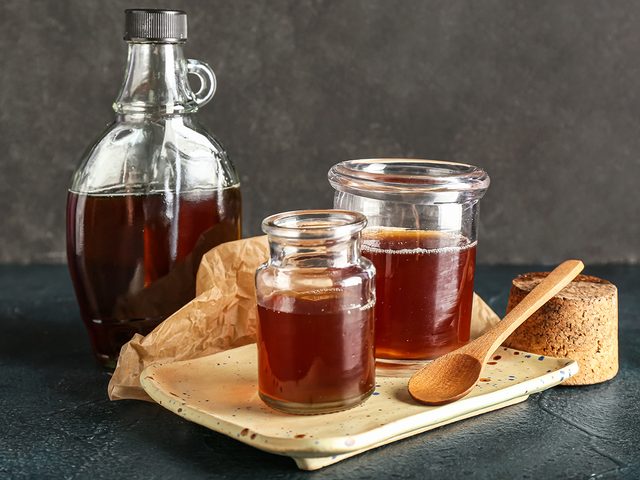 Maple syrup in bottles and jars