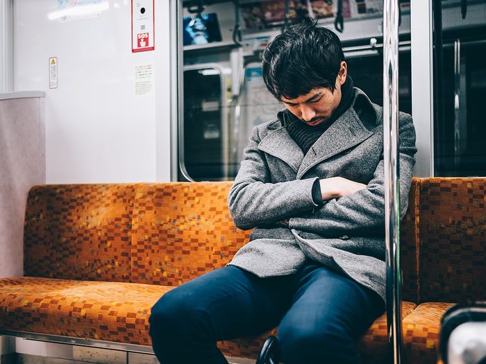 Sleeping Tips - Man Napping On Train