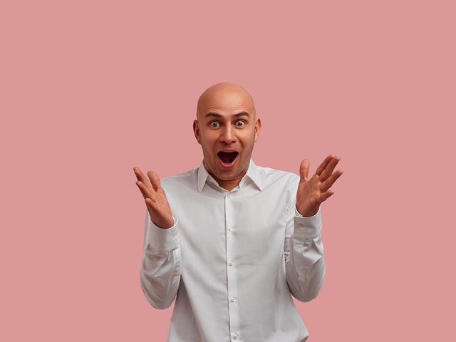 Surprised bald man