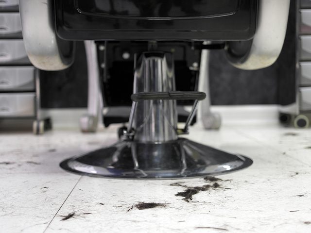 Barber chair with hair clippings