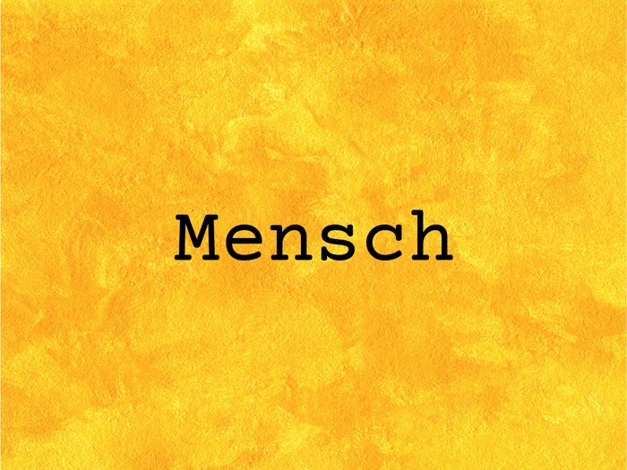 Mensch on yellow background