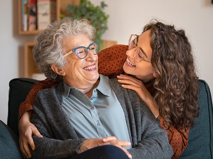 Yiddish Words - Bubbe - Young woman with her arms around older woman