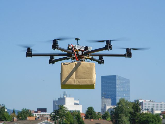 Drone carrying package